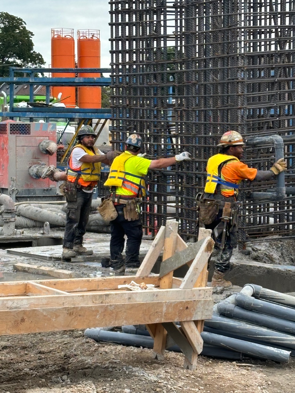 Rebar cage being moved into position.